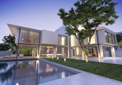 External view of a contemporary house with pool at dusk